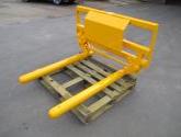 Murray Machinery Wrapped Bale Handler for handling and stacking wrapped round silage bales.